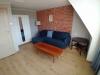 Apartament nr 4 - Pokój gościnny, sofa, stolik